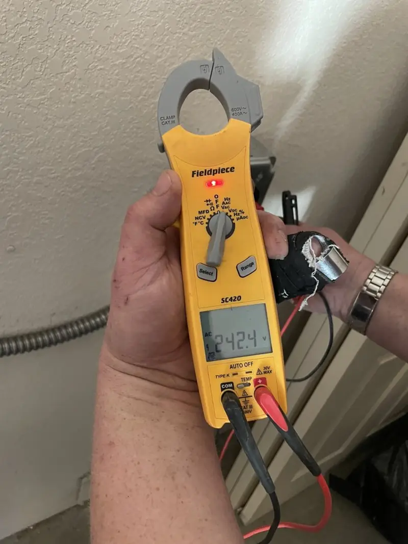 Voltage testing with clamp meter during Circuit Breaker Repair in Glenolden